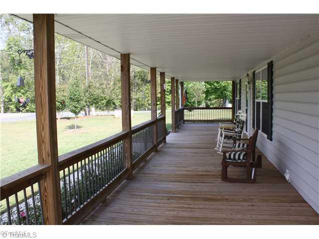 113 Miller Road Mount Airy, NC 27030 - Photo 6 of 16 Exterior Front. Rocking Chair Front Porch