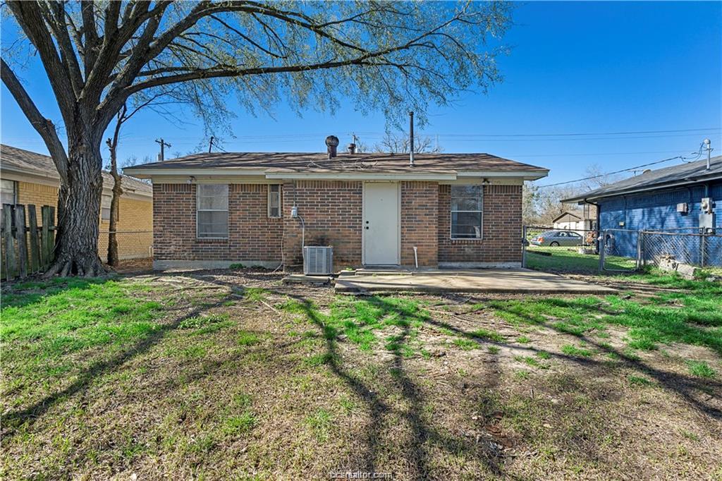 1907 Orman Street Bryan, TX 77801 - Photo 20 of 20 a view of a house with backyard and garden