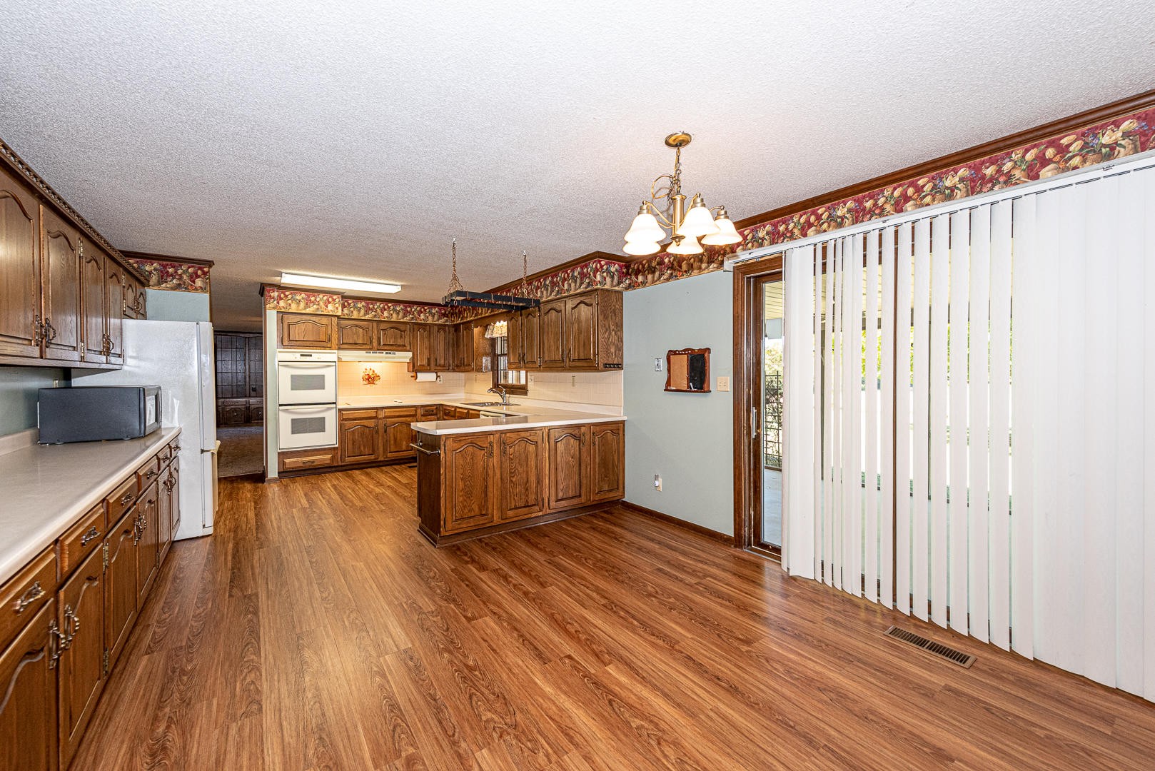 4333 Morganton Road Maryville, TN 37801 - Photo 11 of 40 a kitchen with stainless steel appliances a sink and stove top oven