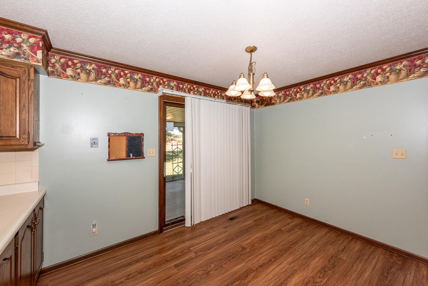 4333 Morganton Road Maryville, TN 37801 - Photo 13 of 40 a view of a room with wooden floor and chandelier