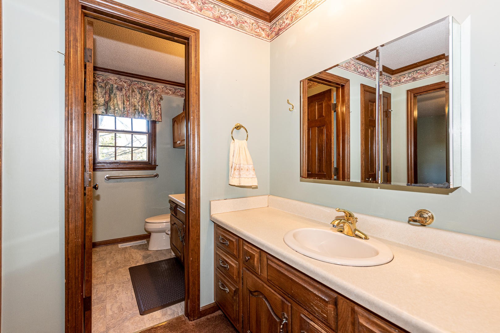 4333 Morganton Road Maryville, TN 37801 - Photo 18 of 40 a bathroom with a sink a toilet and a mirror