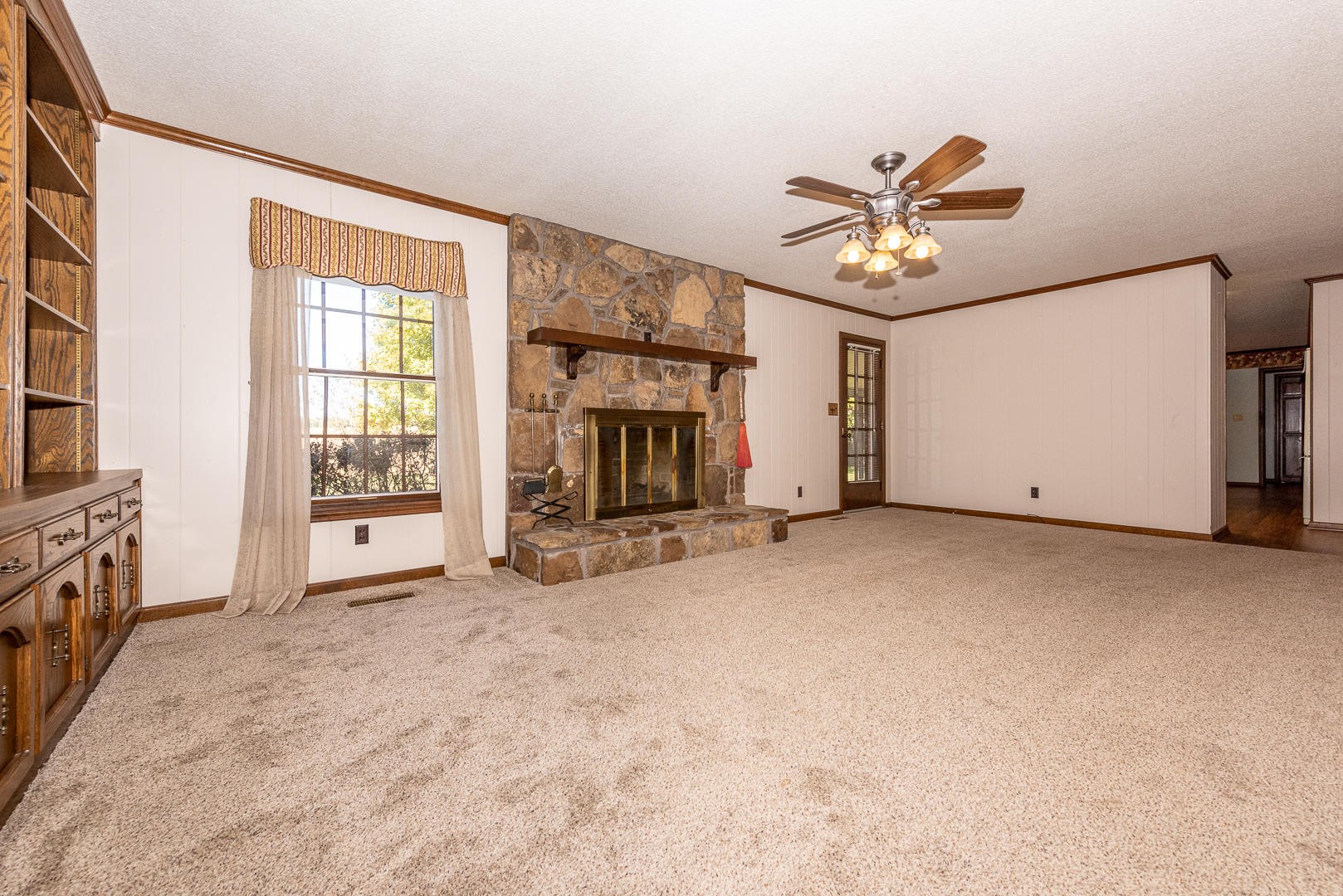 4333 Morganton Road Maryville, TN 37801 - Photo 9 of 40 a view of an empty room with a fireplace and a window