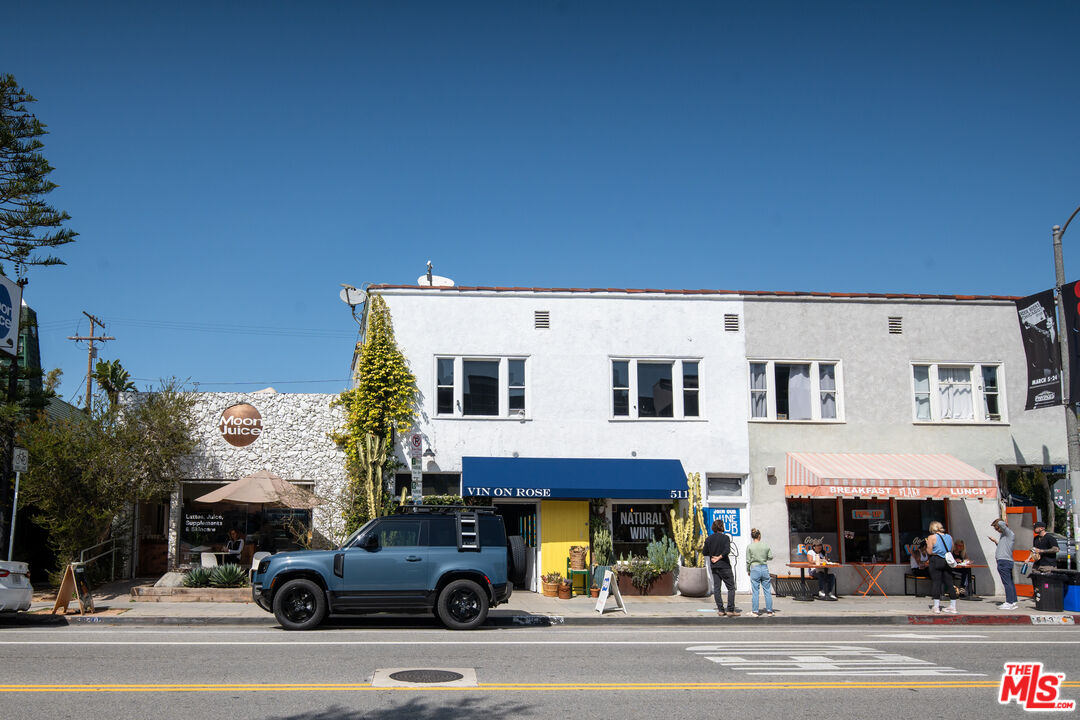 255 Main Street, Unit 101 Venice, CA 90291 - Photo 26 of 28 a view of a building with a car parked on the road
