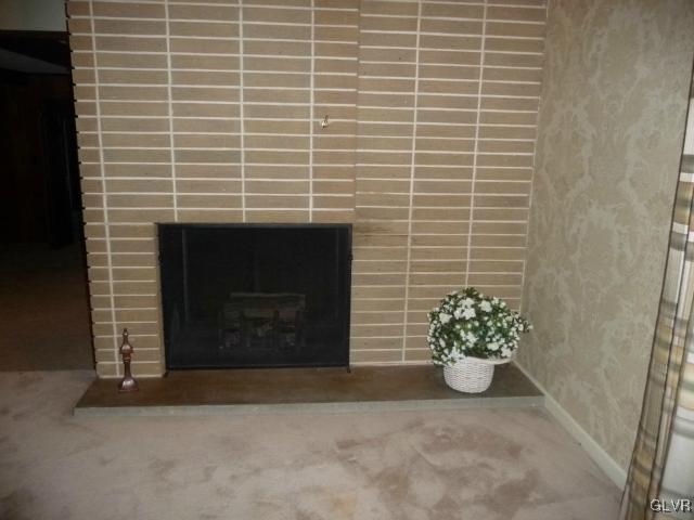 2214 Nottingham Road Allentown, PA 18103 - Photo 22 of 40 TWO WAY FIREPLACE FROM LIVING ROOM