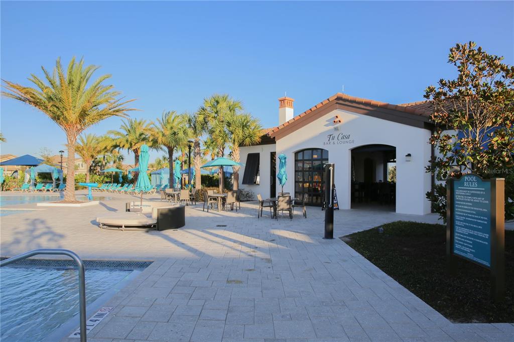 8809 Rhodes Street Kissimmee, FL 34747 - Photo 37 of 49 a front view of a house with patio
