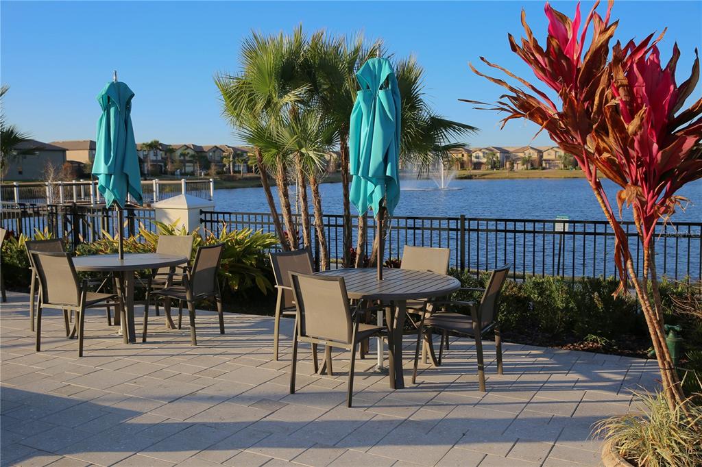 8809 Rhodes Street Kissimmee, FL 34747 - Photo 38 of 49 a view of a chairs and tables in the patio