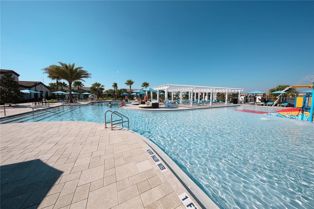8809 Rhodes Street Kissimmee, FL 34747 - Photo 46 of 49 a view of swimming pool with outdoor seating