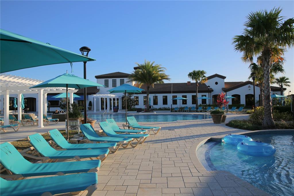 8809 Rhodes Street Kissimmee, FL 34747 - Photo 47 of 49 a front view of a house with garden