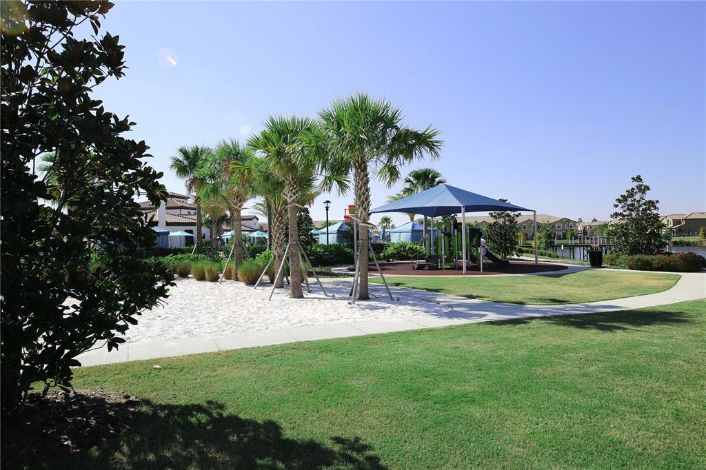 8809 Rhodes Street Kissimmee, FL 34747 - Photo 48 of 49 a view of patio with swimming pool and outdoor seating