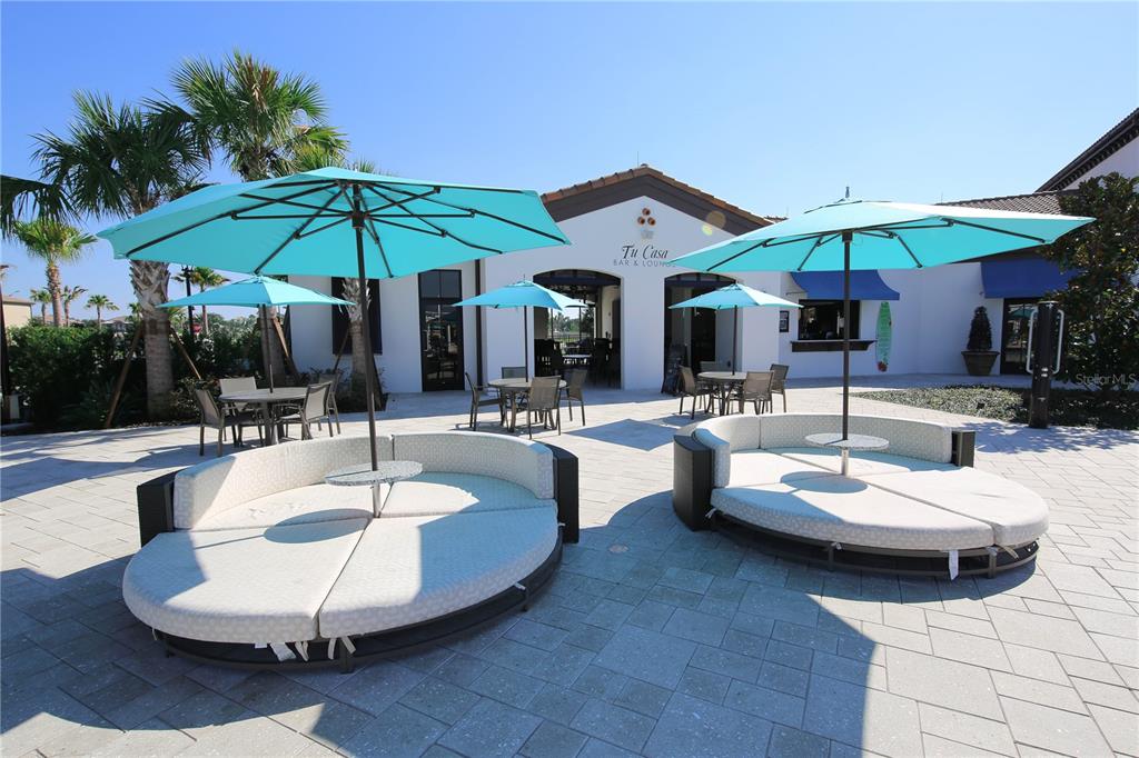 8809 Rhodes Street Kissimmee, FL 34747 - Photo 8 of 49 a view of a patio with a table and chairs