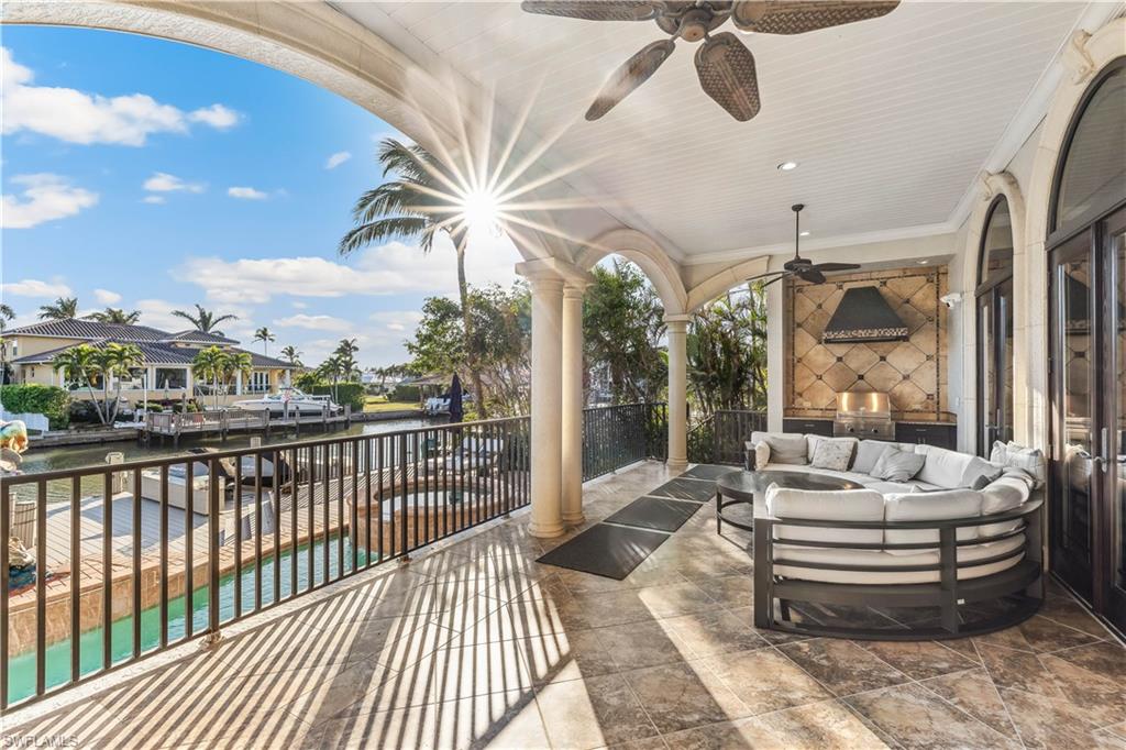 280 Egret Avenue Naples, FL 34108 - Photo 37 of 44 The outdoor ambiance for family gatherings or relaxing evenings for the owners