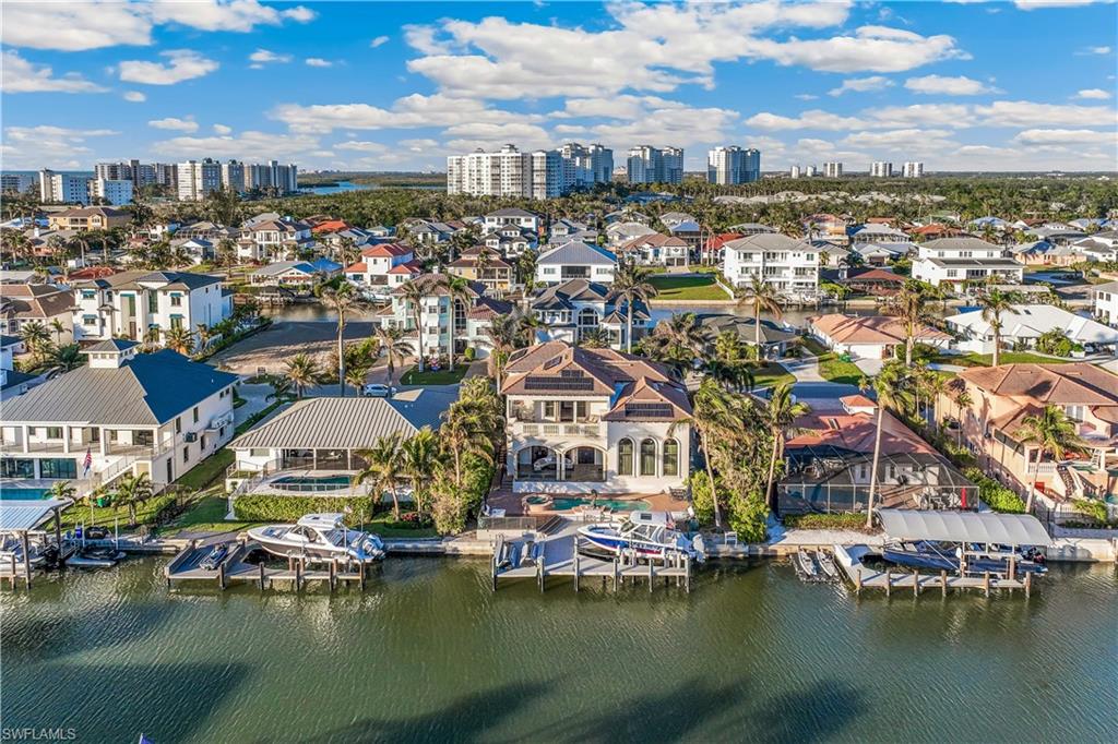 280 Egret Avenue Naples, FL 34108 - Photo 42 of 44 Drone / aerial view featuring a water view
