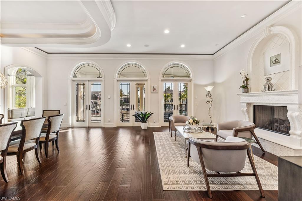 280 Egret Avenue Naples, FL 34108 - Photo 10 of 44 Large open floor plan of Living / Dining area with exquisite detail and craftsmanship