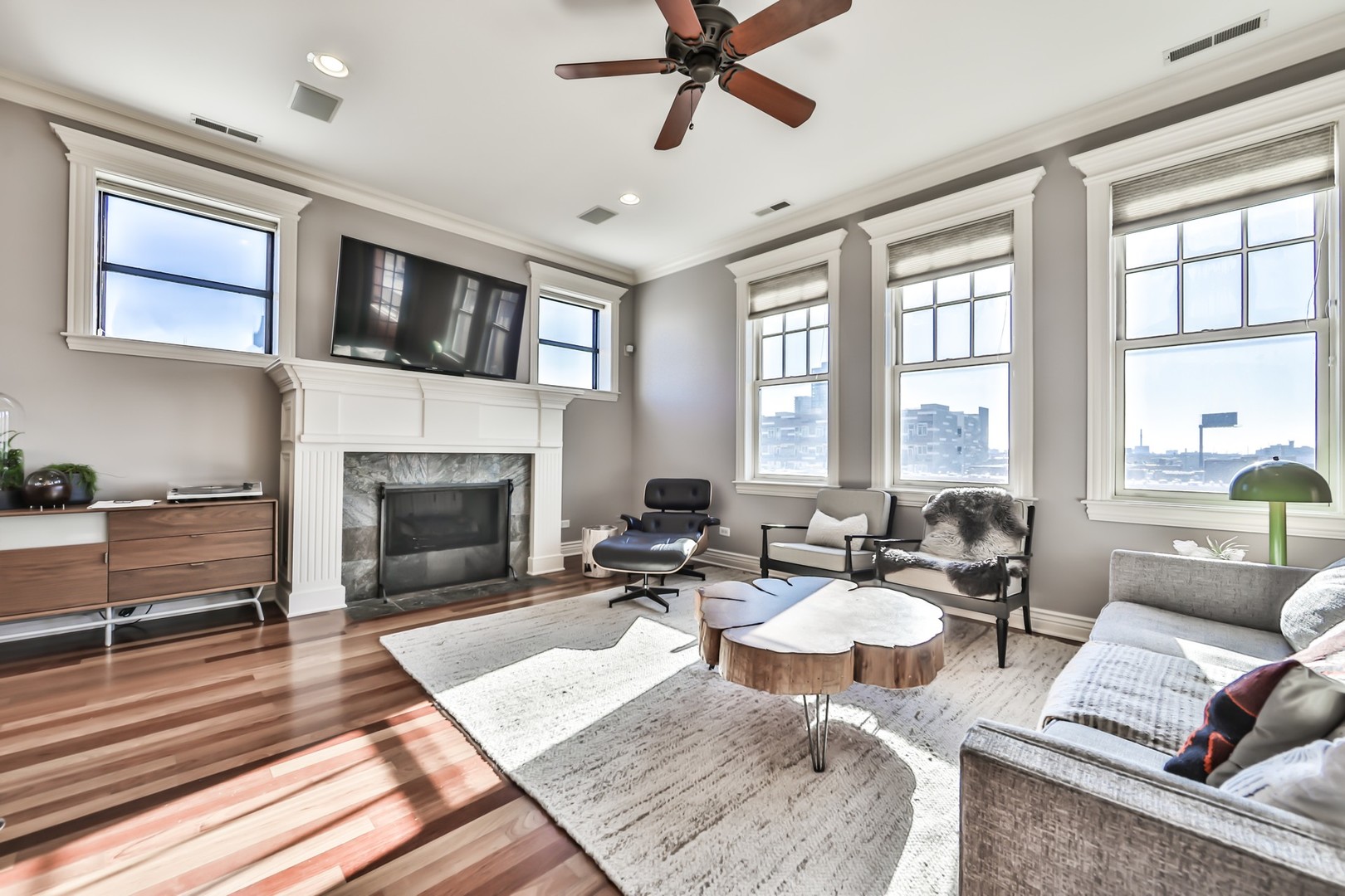 1148 West Monroe Street, Unit 5SE Chicago, IL 60607 - Photo 4 of 25 a living room with furniture and a fireplace