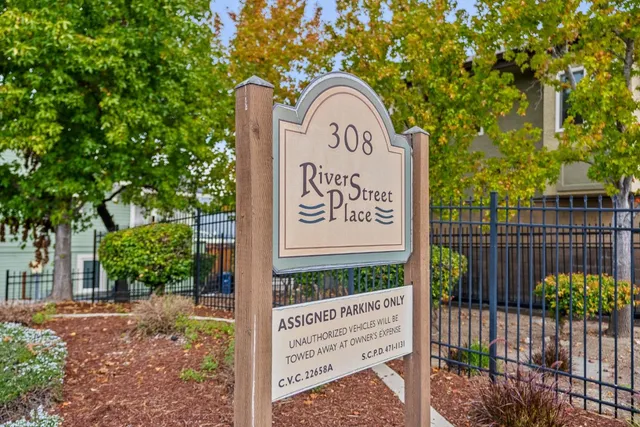a view of parking space with city view