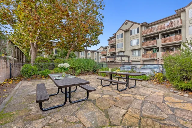 a view of a swimming pool with a lounge chair