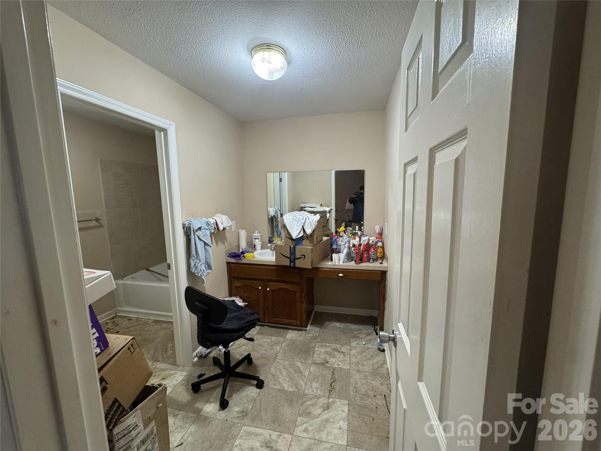8441 Shelley Mullis Road Fort Mill, SC 29707 - Photo 13 of 23 a view of a workspace with furniture and a window