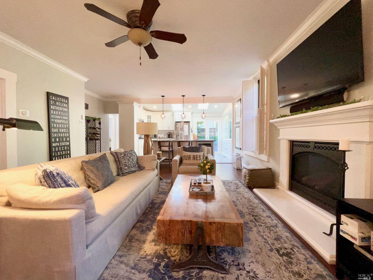 1320 Elmhurst Avenue St. Helena, CA 94574 - Photo 1 of 1 a living room with furniture and a fireplace