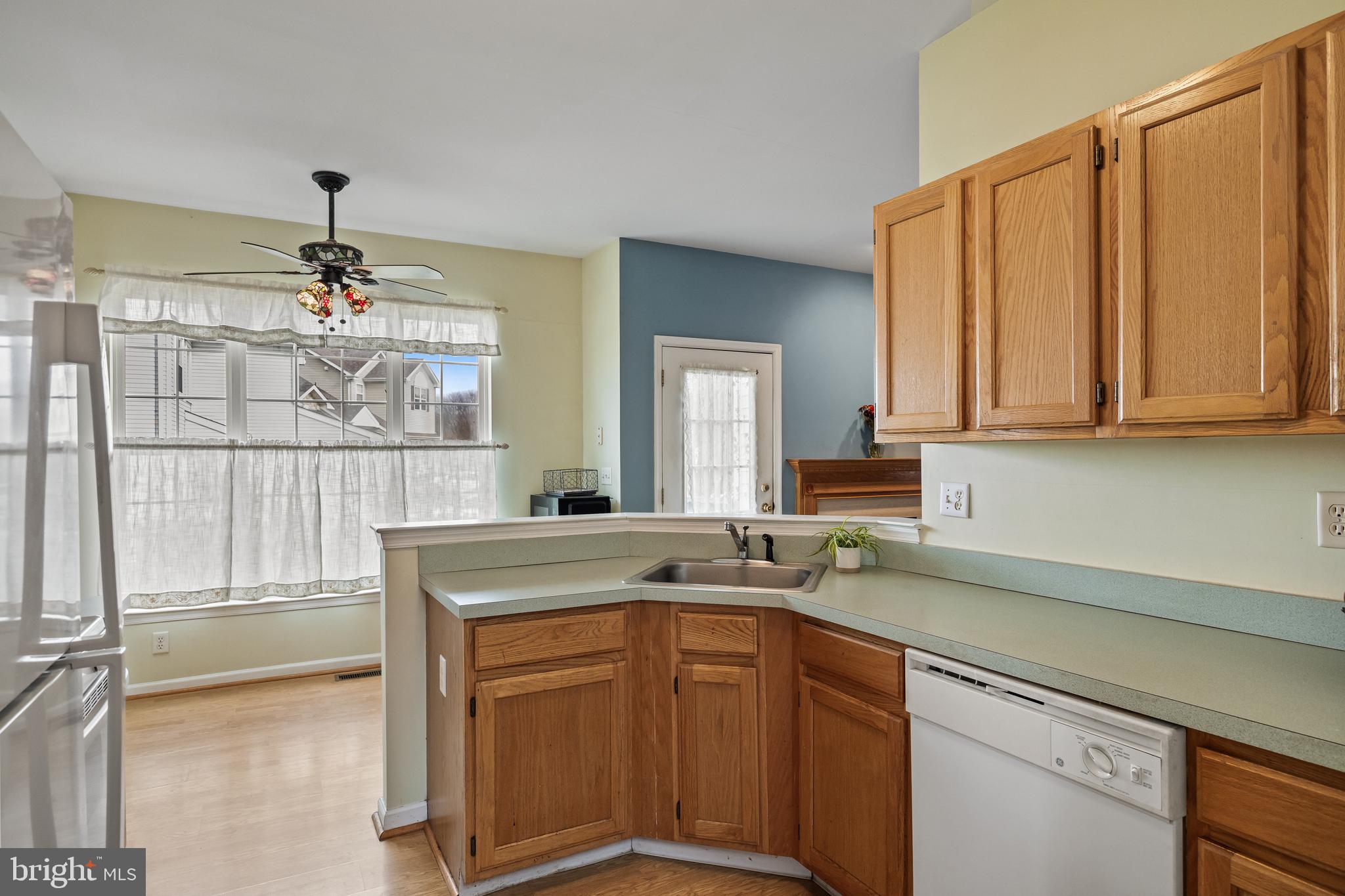 33 Colts Gait Road Marlton, NJ 08053 - Photo 12 of 41 a kitchen with granite countertop a sink stainless steel appliances and cabinets