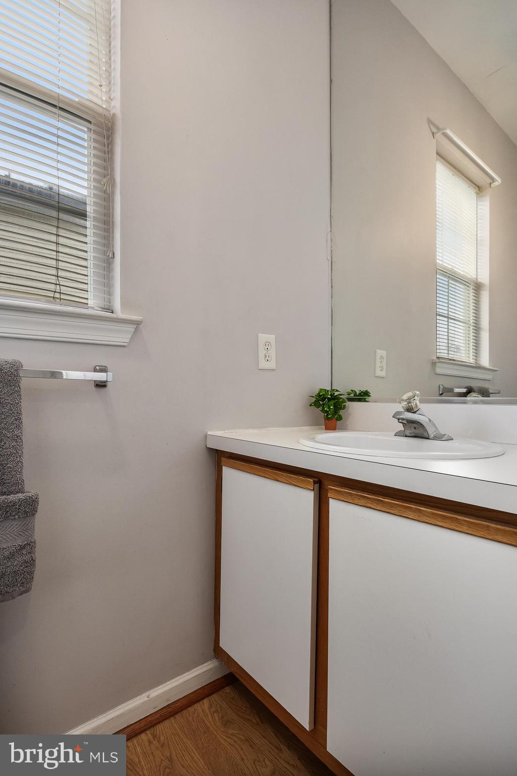 33 Colts Gait Road Marlton, NJ 08053 - Photo 19 of 41 a bathroom with a sink and a mirror