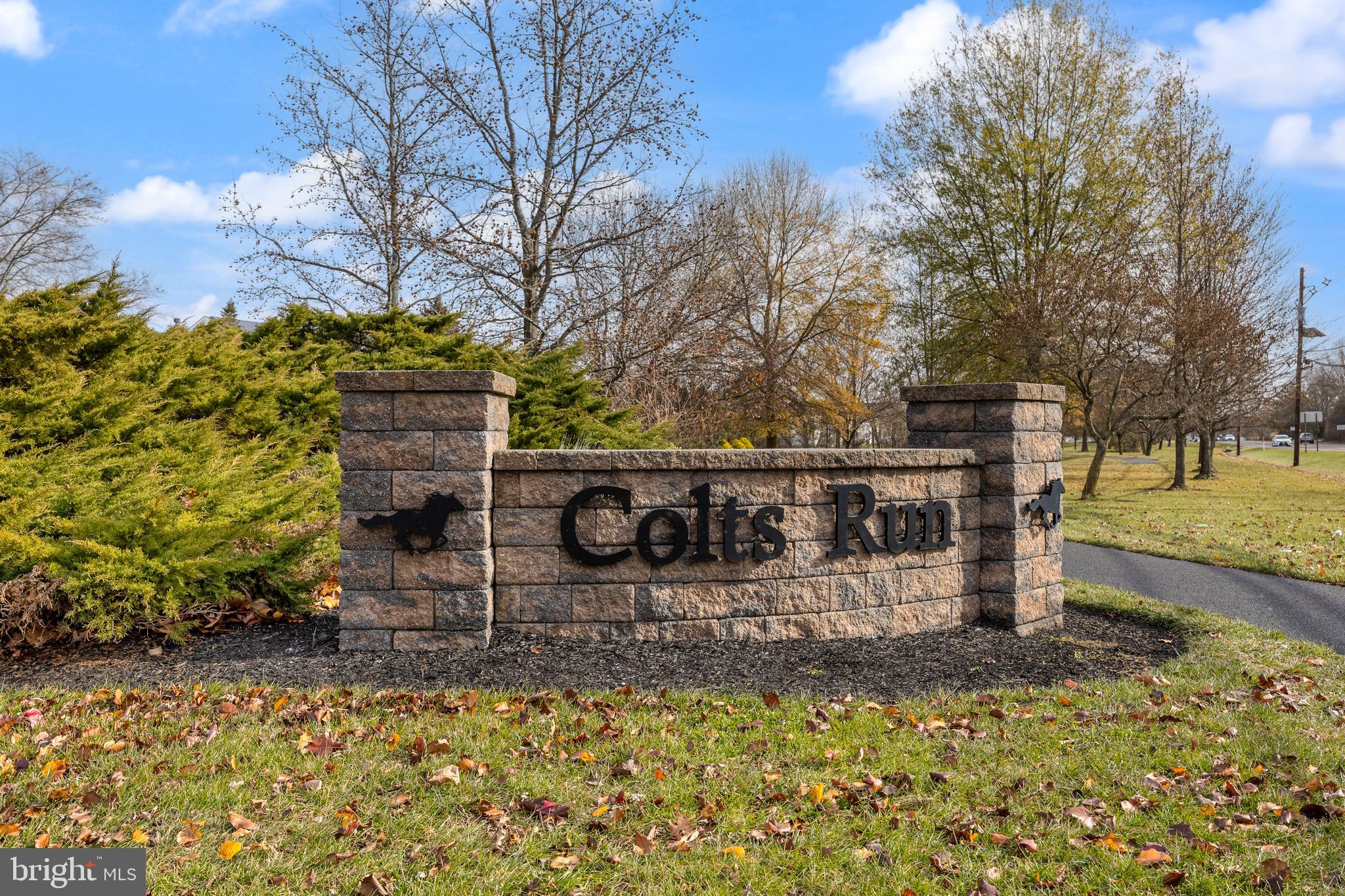 33 Colts Gait Road Marlton, NJ 08053 - Photo 35 of 41 a wooden bench sitting in the middle of a yard