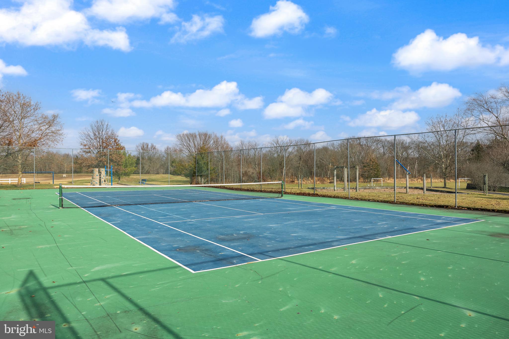 33 Colts Gait Road Marlton, NJ 08053 - Photo 39 of 41 a view of an outdoor space and tennis court