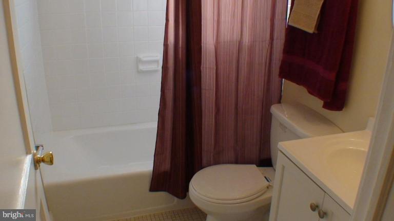 1921 Jasmine Road Dundalk, MD 21222 - Photo 6 of 9 a bathroom with a sink and toilet