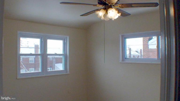 1921 Jasmine Road Dundalk, MD 21222 - Photo 9 of 9 a view of an empty room with a window