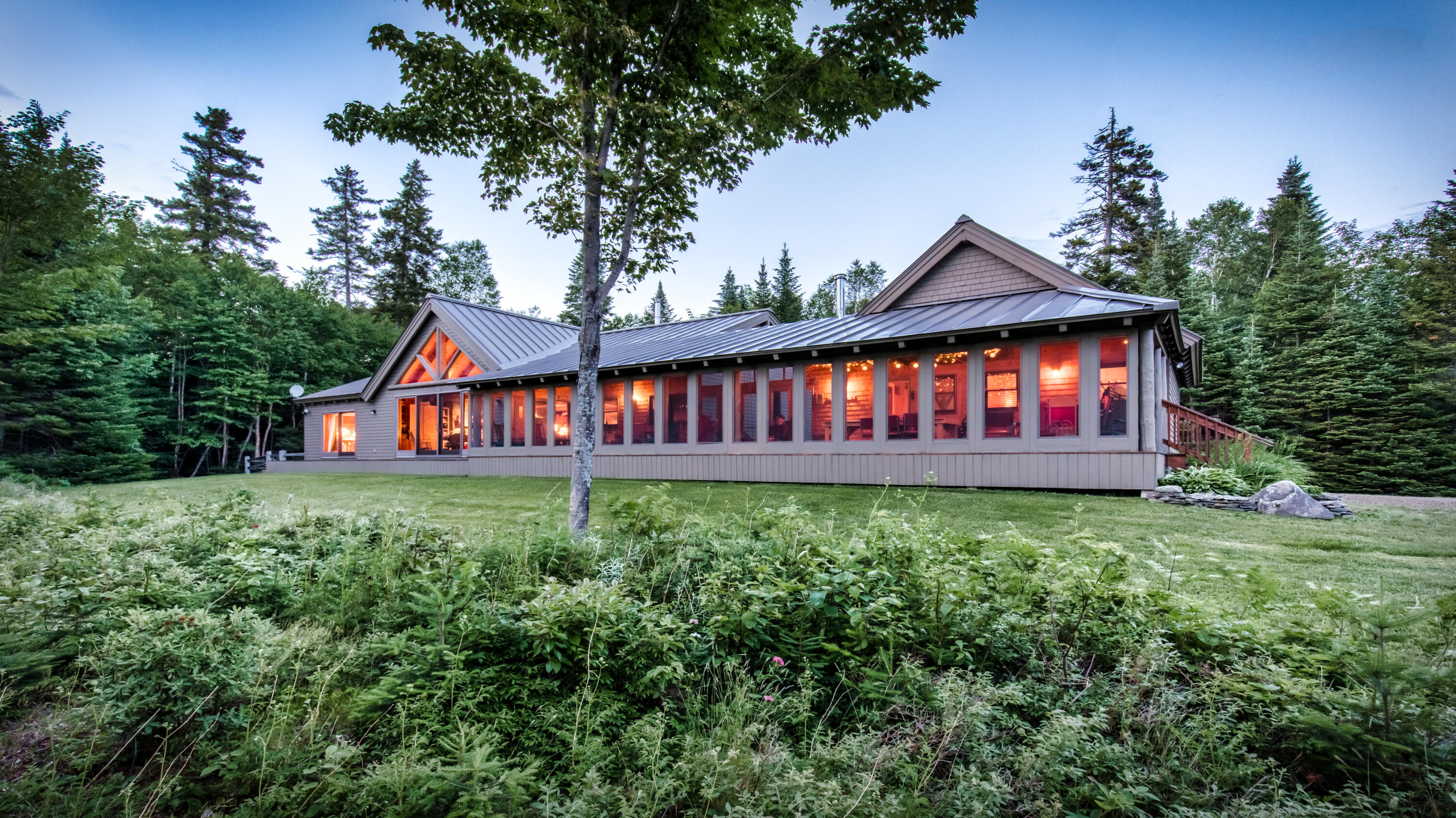 1858 Kennebago River Road Rangeley, ME 04970 - Photo 1 of 28 Lodge at Kennebago HDLodge at dusk