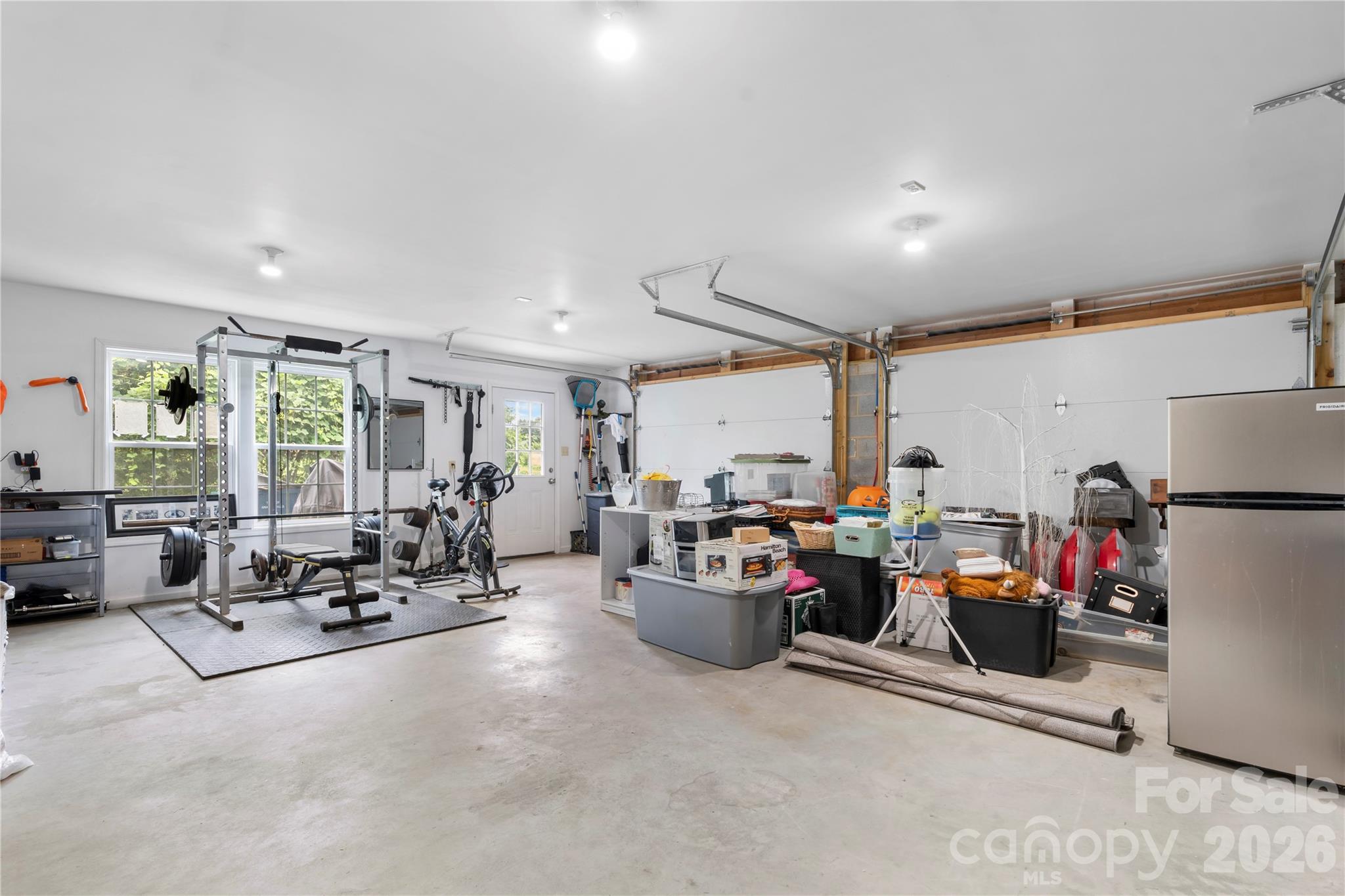 111 Pinewood Road Granite Falls, NC 28630 - Photo 30 of 33 a room with gym equipment and large window