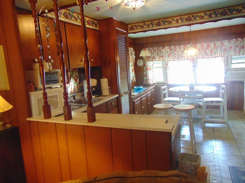 3132 Cranberry Highway, Unit 56 Wareham, MA 02538 - Photo 11 of 20 a view of a living room and dining room