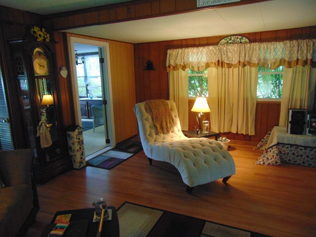 3132 Cranberry Highway, Unit 56 Wareham, MA 02538 - Photo 13 of 20 a living room with furniture window and wooden floor