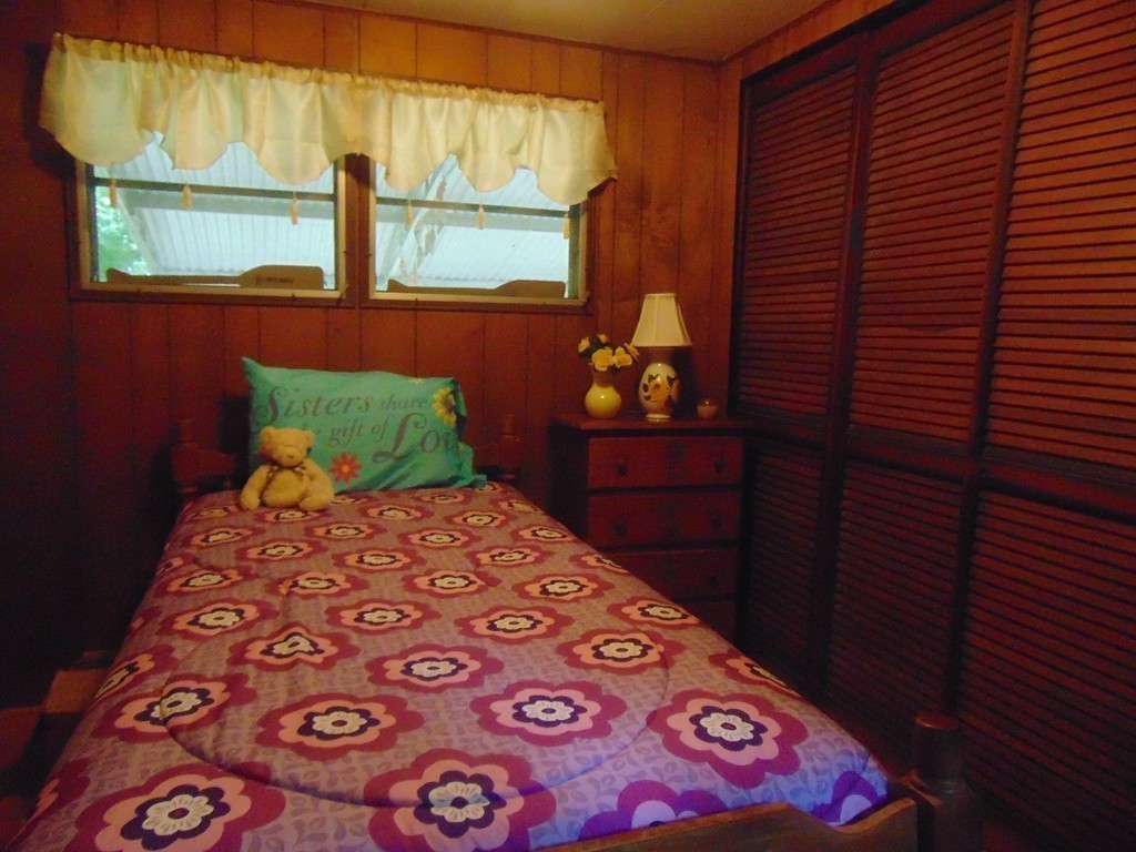 3132 Cranberry Highway, Unit 56 Wareham, MA 02538 - Photo 15 of 20 a bedroom with a bed and a window