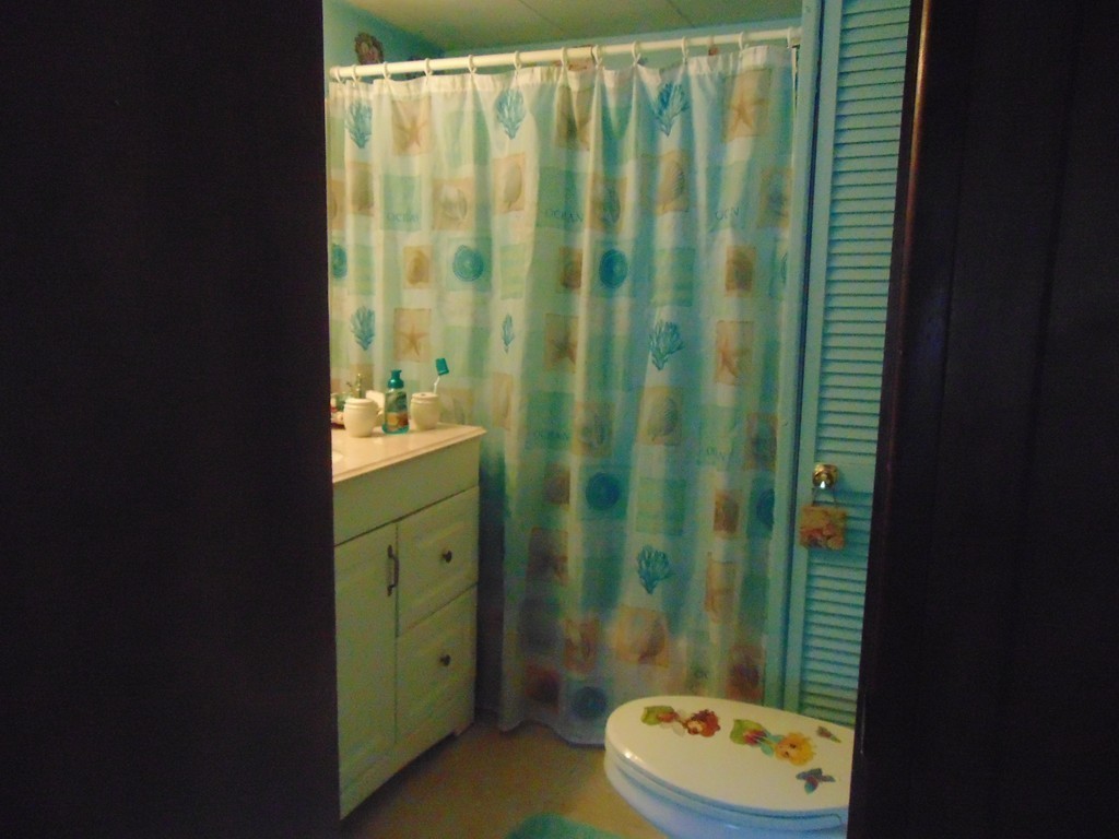 3132 Cranberry Highway, Unit 56 Wareham, MA 02538 - Photo 17 of 20 a bathroom with a sink a toilet and shower