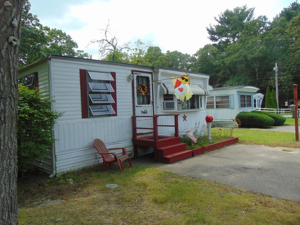 3132 Cranberry Highway, Unit 56 Wareham, MA 02538 - Photo 2 of 20 a childrens park with lots of swings and slides