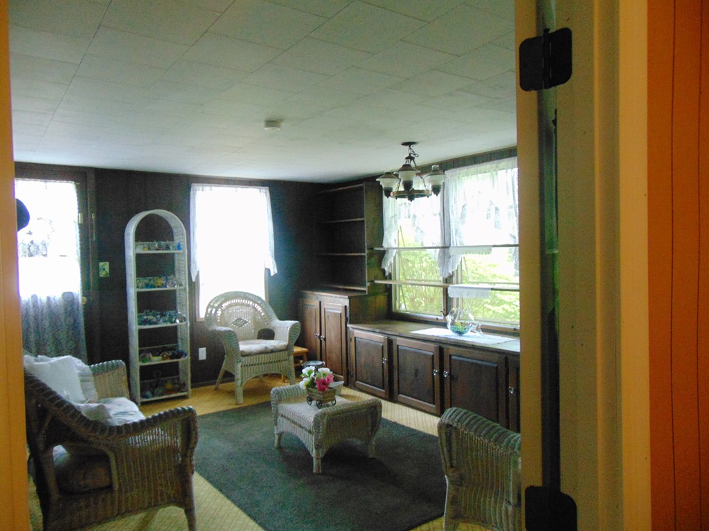 3132 Cranberry Highway, Unit 56 Wareham, MA 02538 - Photo 7 of 20 a living room with furniture and a window
