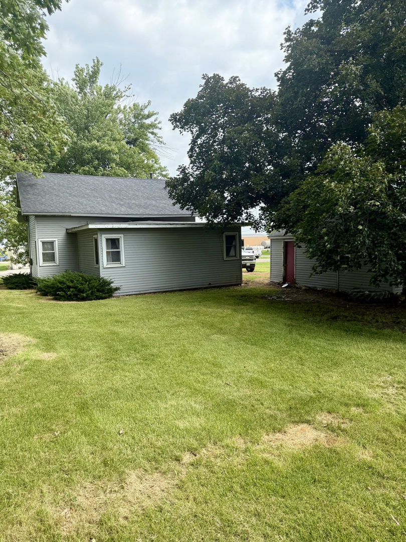 303 West Plumb Street Ransom, IL 60470 - Photo 12 of 12 a view of a house with a garden