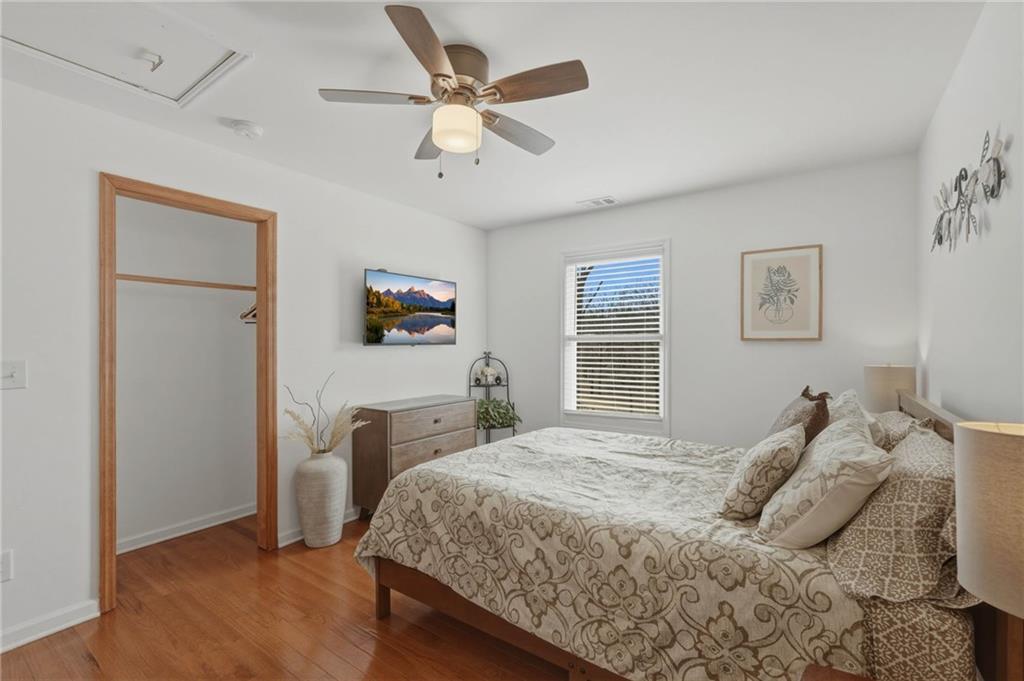 3812 James Ed Road Gainesville, GA 30506 - Photo 14 of 27 a bedroom with a bed and a flat screen tv