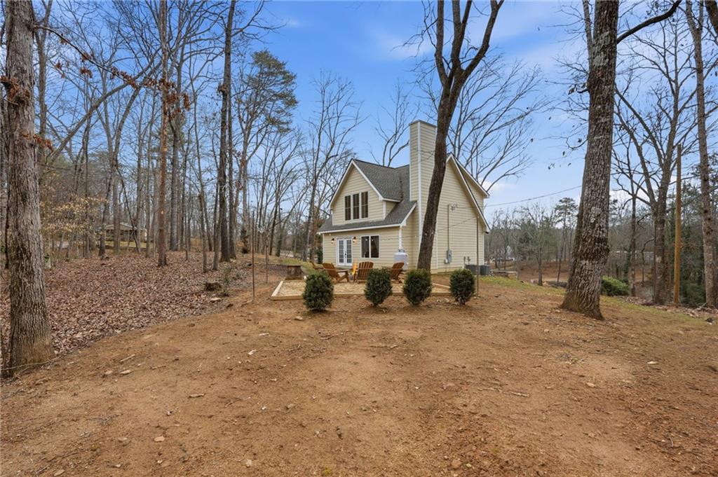 3812 James Ed Road Gainesville, GA 30506 - Photo 21 of 27 a view of a house with a yard covered in snow