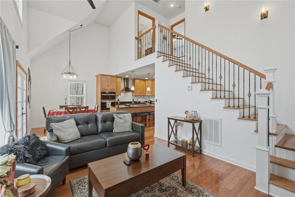3812 James Ed Road Gainesville, GA 30506 - Photo 7 of 27 a living room with furniture and wooden floor