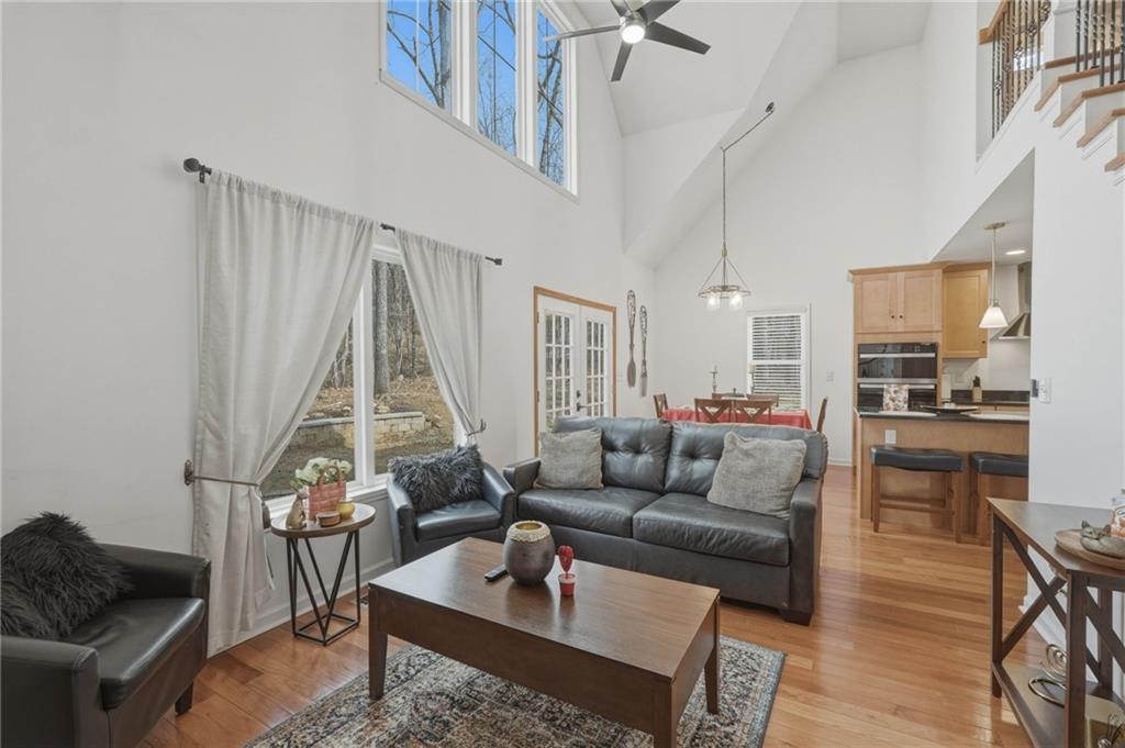3812 James Ed Road Gainesville, GA 30506 - Photo 8 of 27 a living room with furniture and a large window