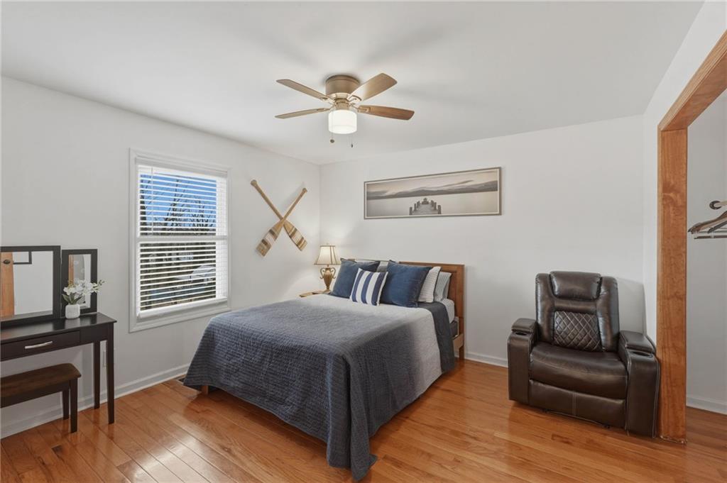 3812 James Ed Road Gainesville, GA 30506 - Photo 10 of 27 a bedroom with a bed and wooden floor