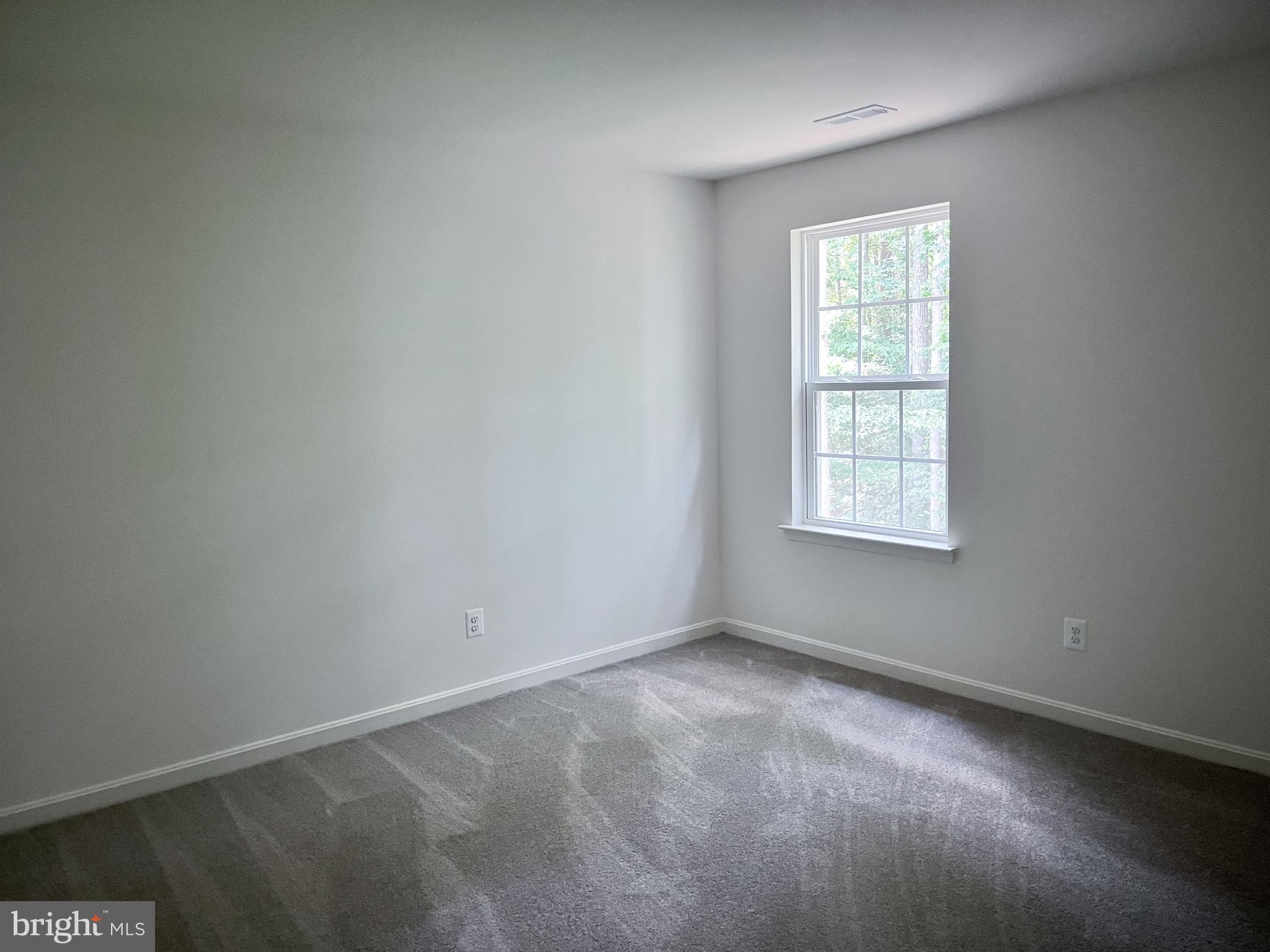 1326 Heaps Road Whiteford, MD 21160 - Photo 15 of 19 an empty room with a window