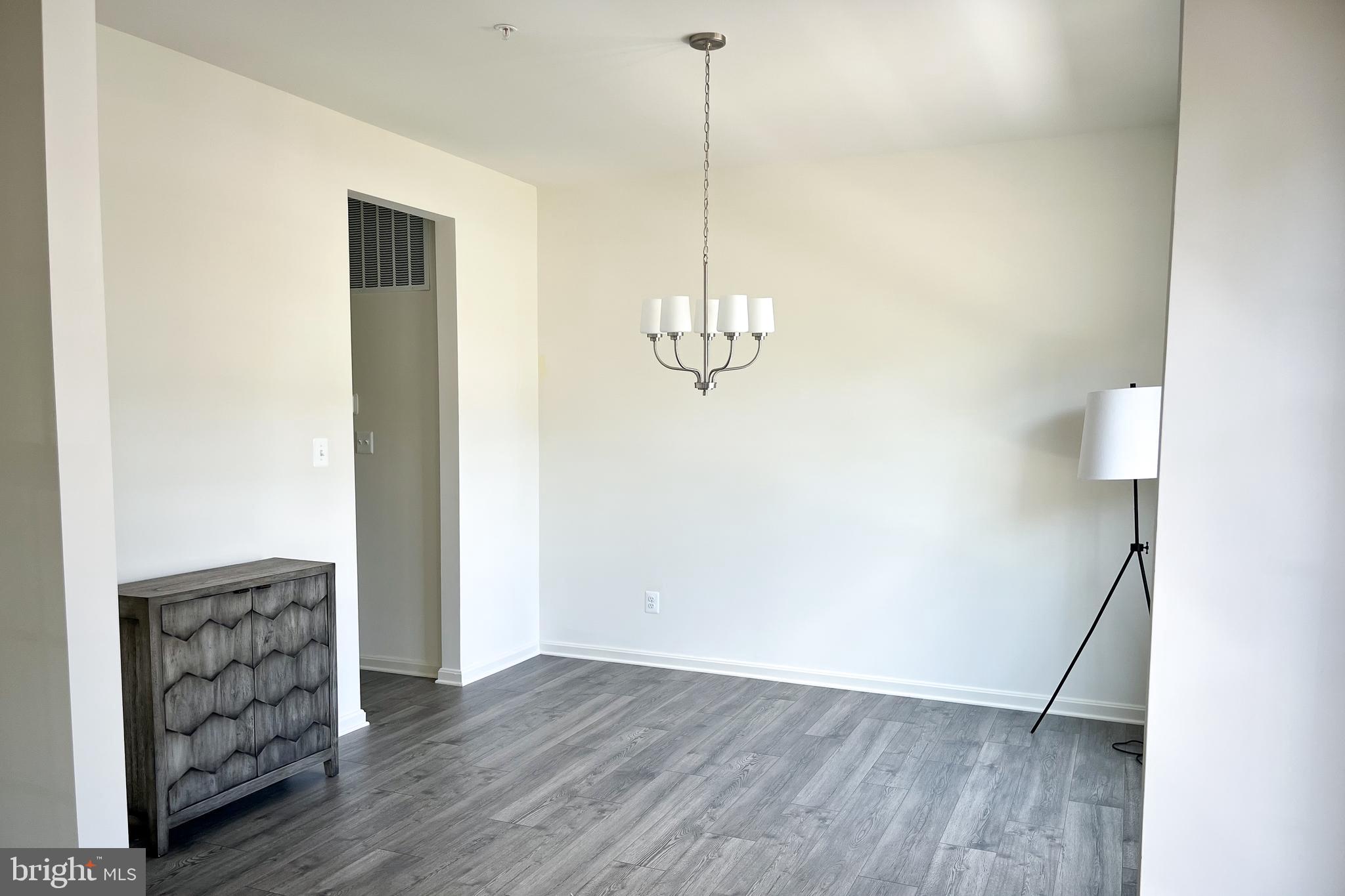 1326 Heaps Road Whiteford, MD 21160 - Photo 2 of 19 a view of empty room with wooden floor