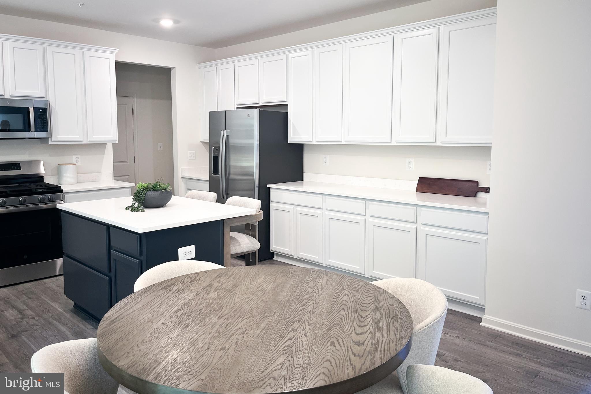 1326 Heaps Road Whiteford, MD 21160 - Photo 7 of 19 a kitchen with a sink appliances and cabinets