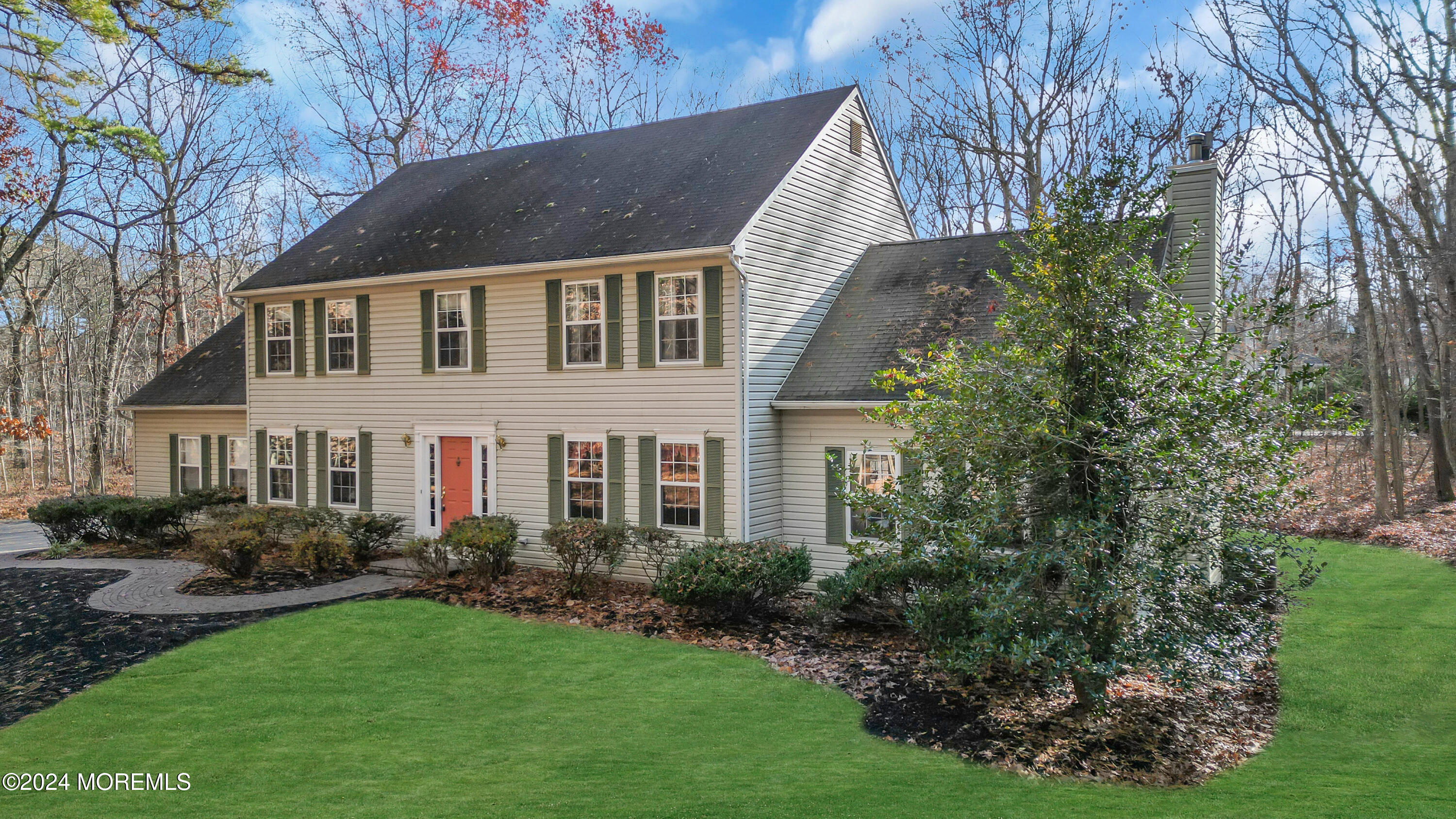 9 Lawrence Spring Road Millstone Township, NJ 08510 - Photo 54 of 64 a front view of a house with garden
