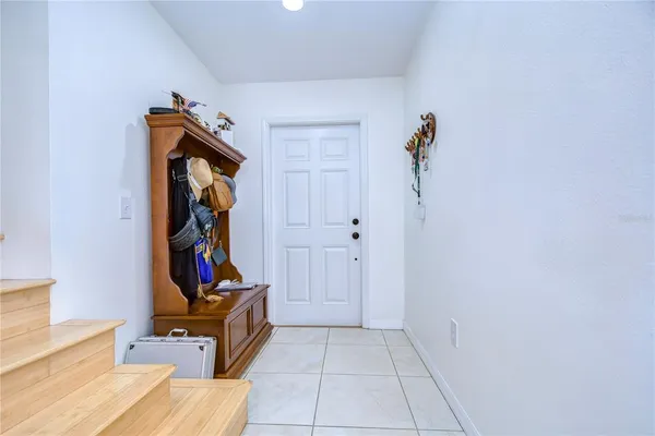 a view of hallway with stairs