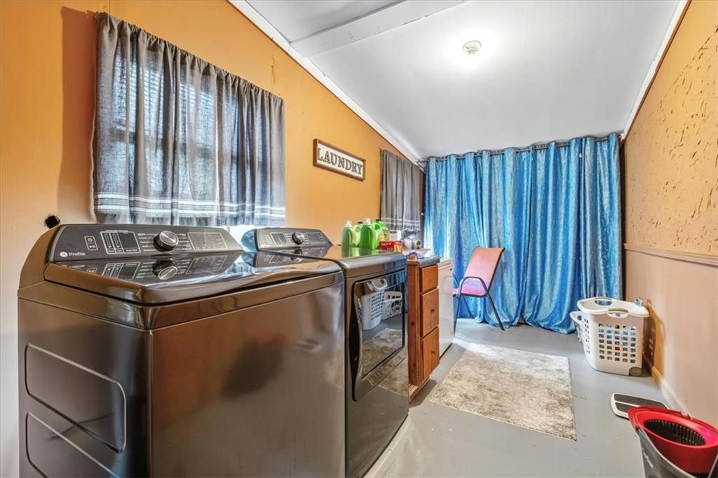 241 River Bend Road Southwest Plainville, GA 30733 - Photo 19 of 27 a utility room with washer and dryer