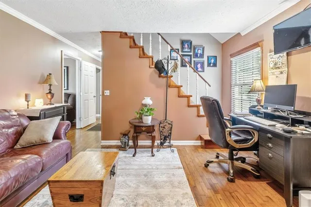 a view of a livingroom with furniture and a couch