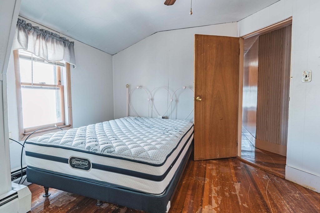 51 Bay Road Revere, MA 02151 - Photo 11 of 34 a room that has a bed and a window